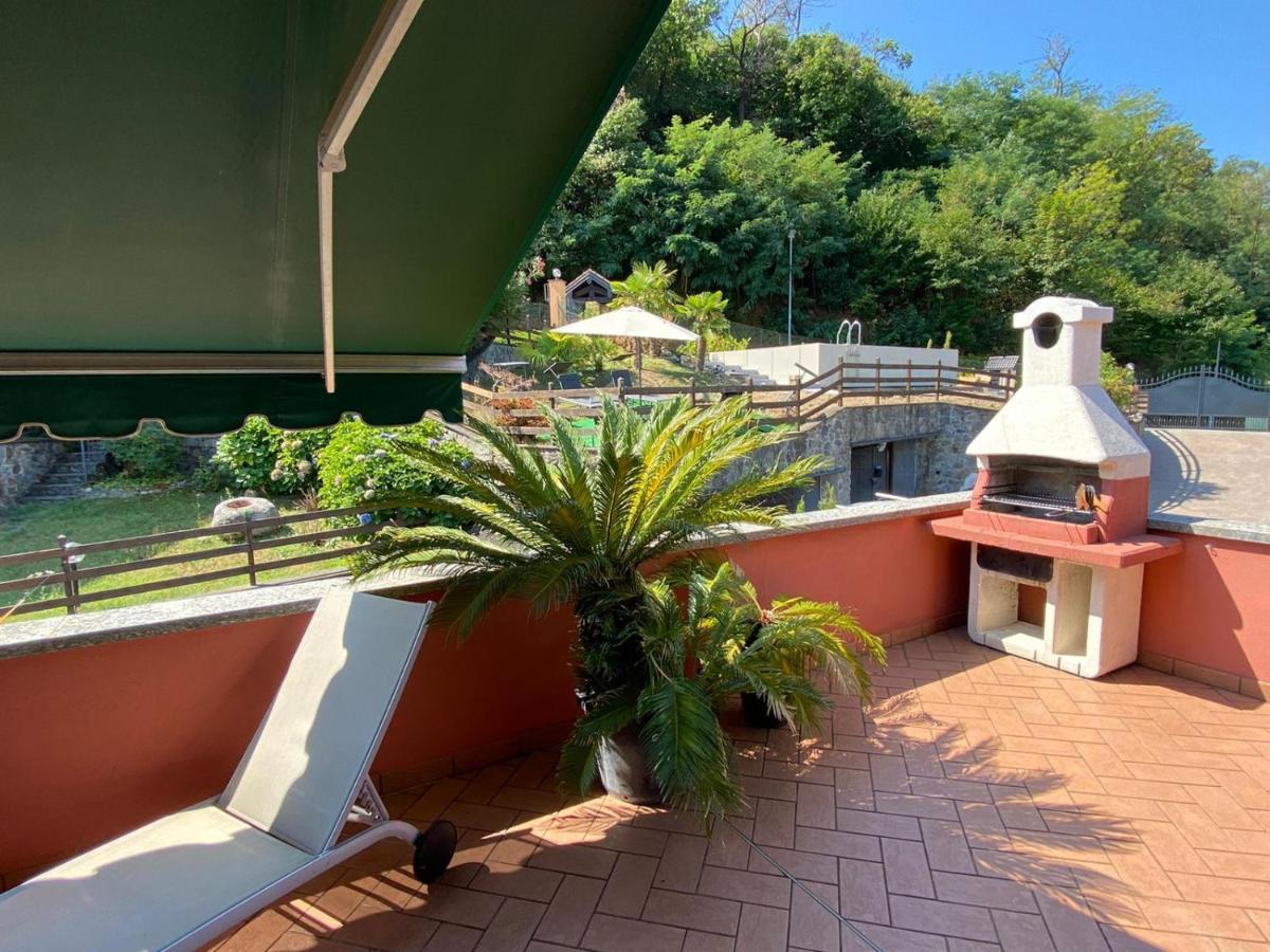 Ferienwohnung Penthouse Andrea Meina Exterior foto